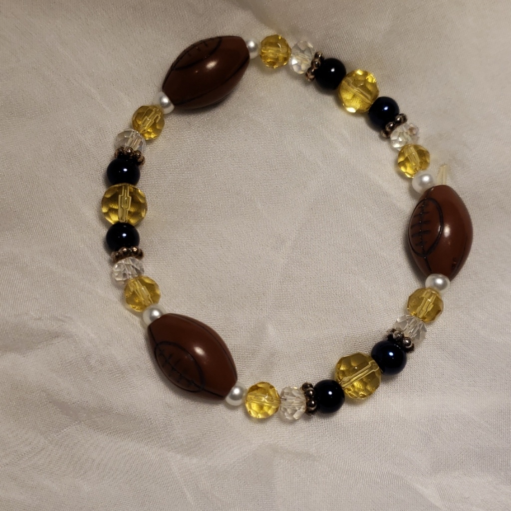 A Stretchy Football Bracelet 11$
